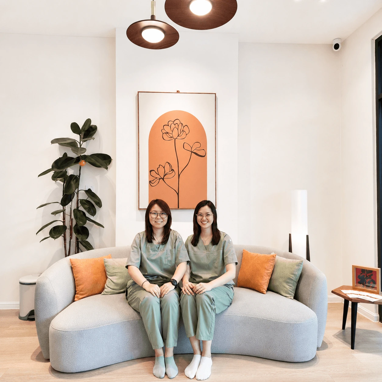 Two dental professionals at Tooth Buddy Dental Clinic Bandar Sungai Long