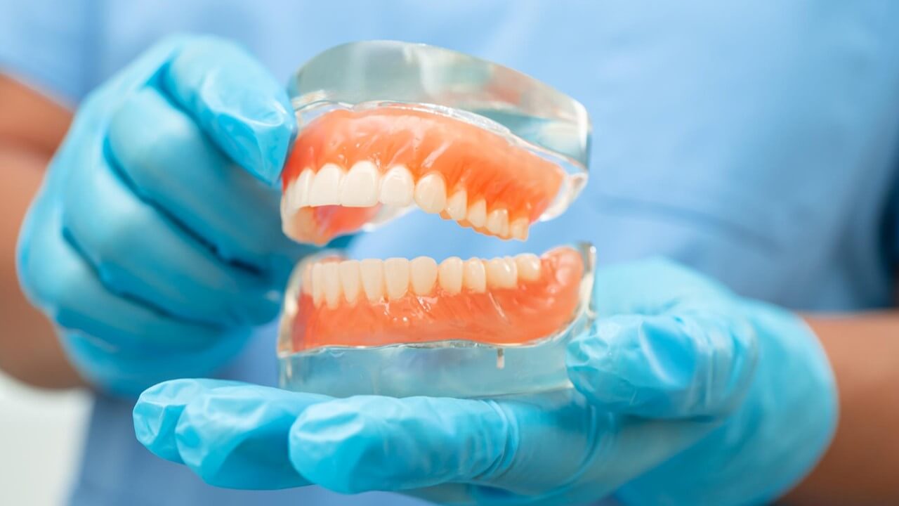 Dentures provide a comfortable and natural-looking solution for restoring your smile and improving functionality after tooth loss.